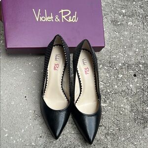 Elegant Black Leather Heels with Classic Design